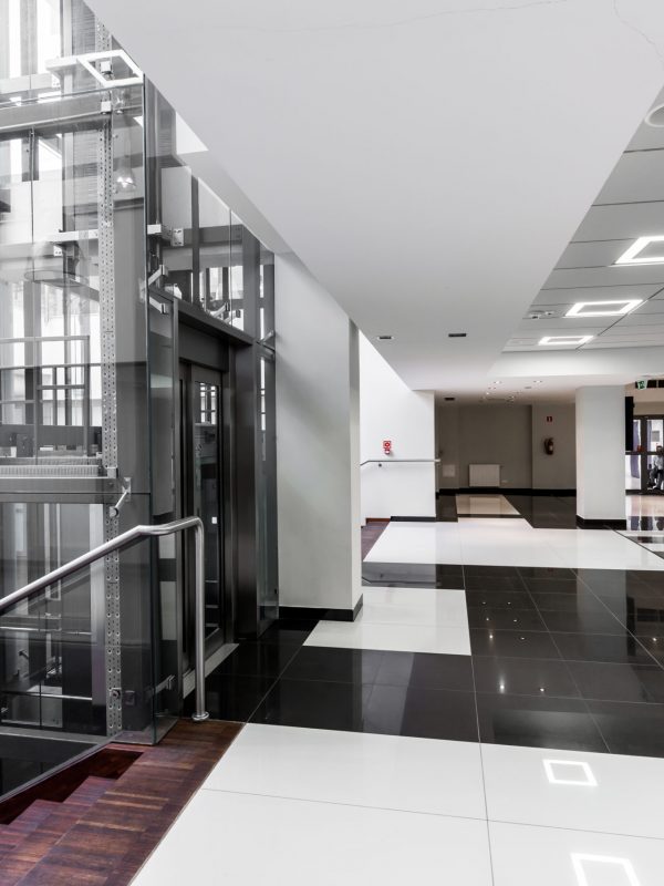 Shot of a modern hallway in univeristy bulding with an elevator for disabled students